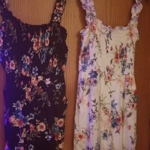 Adorable sun suit/ shorts that appear as a skirt.